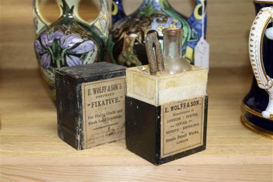 A collection of advertising arts materials, bottles etc
